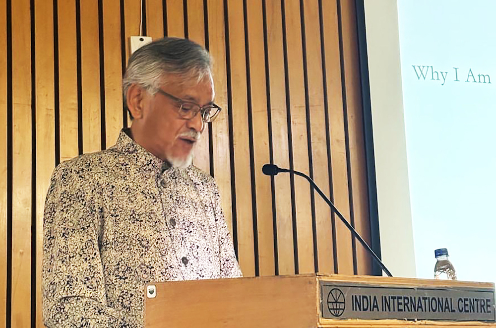 Prof Tadanori Nagasawa speaking at the podium, India International Centre